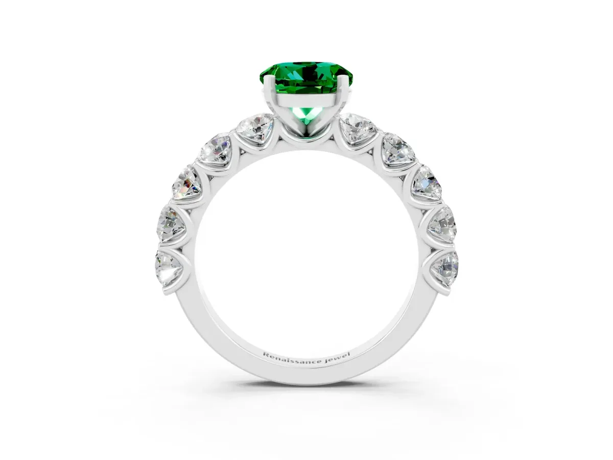Round Cut Emerald Prong Setting with Side Stones on a Pave Band Platinum