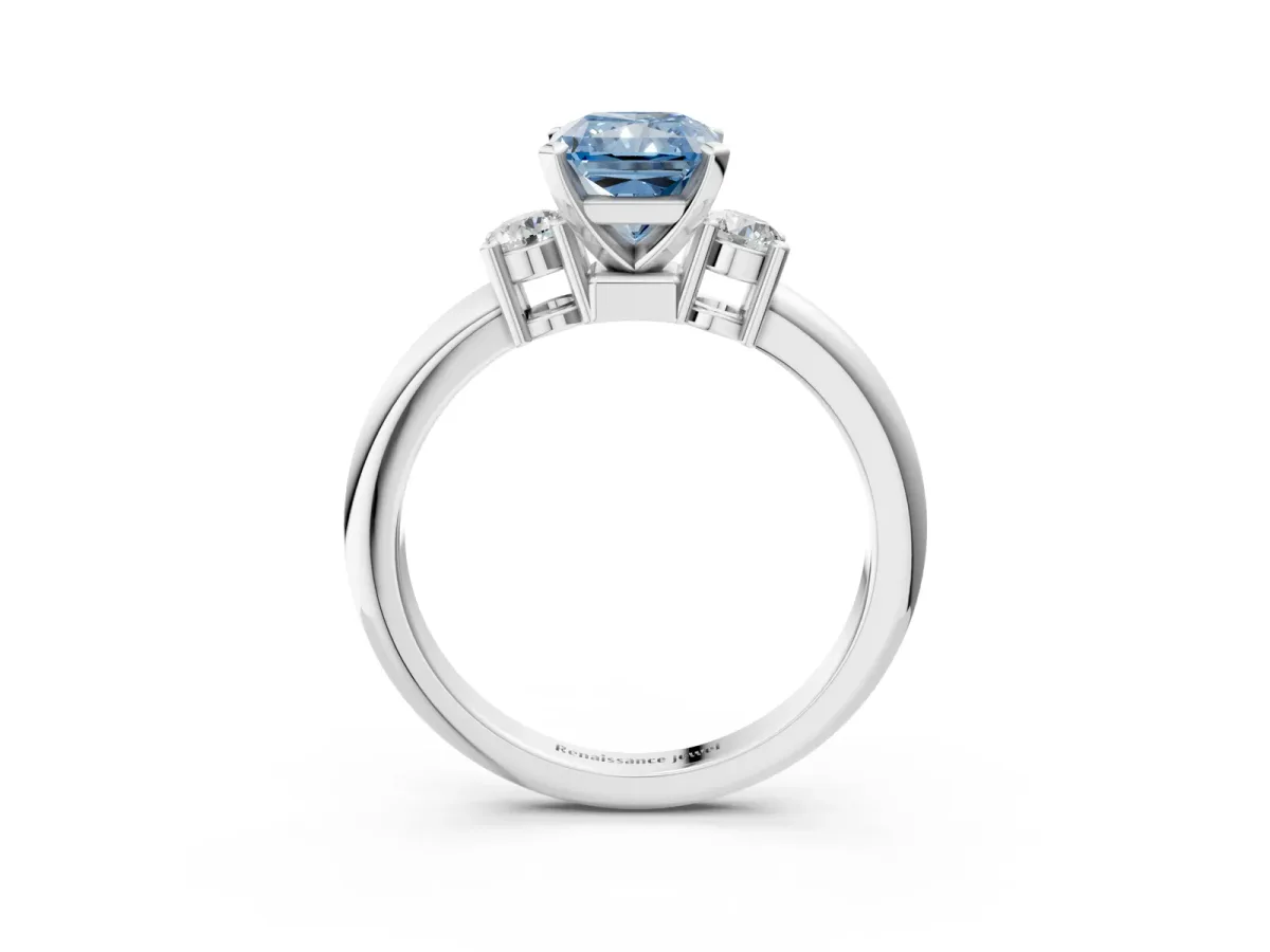 Fancy Blue Three-Stone Radiant Cut Cut Diamond Solitaire with Prong Setting and Classic Band Platinum