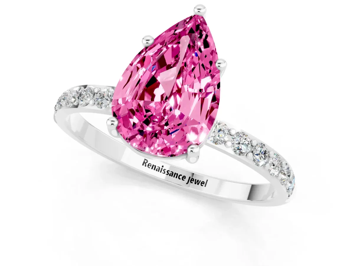 Pear Cut Pink Sapphire Solitaire Ring with Round Pavé Band and Prong Setting Silver