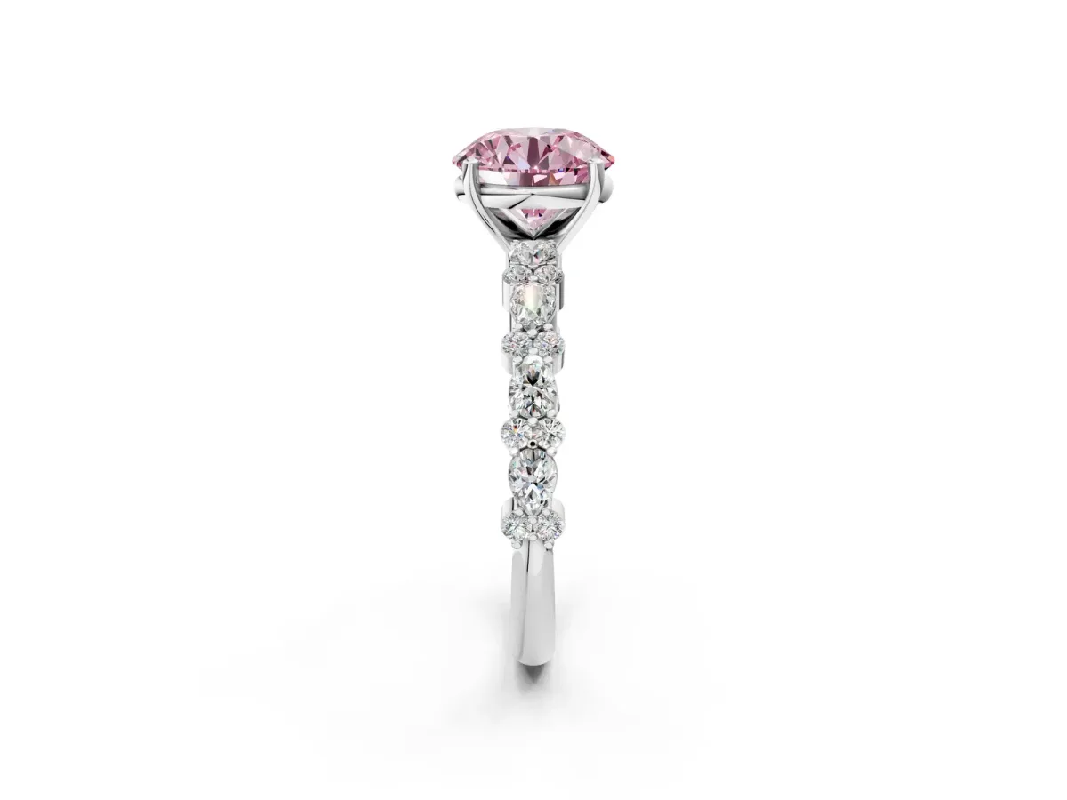 Fancy Pink Round Cut Diamond Side Stone Solitaire Ring with Round and Four-Prong Setting Silver