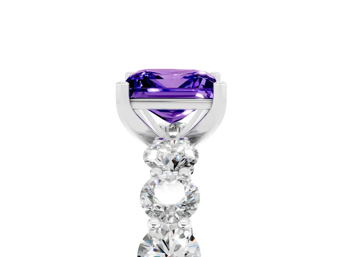 Princess Cut Tanzanite Prong Setting with Side Stones on a Pave Band Silver
