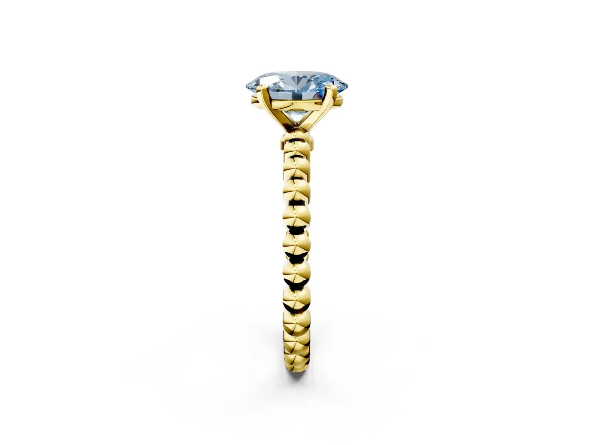 Fancy Blue Oval Cut Diamond Solitaire Ring with Beaded Band and Prong Setting Yellow gold