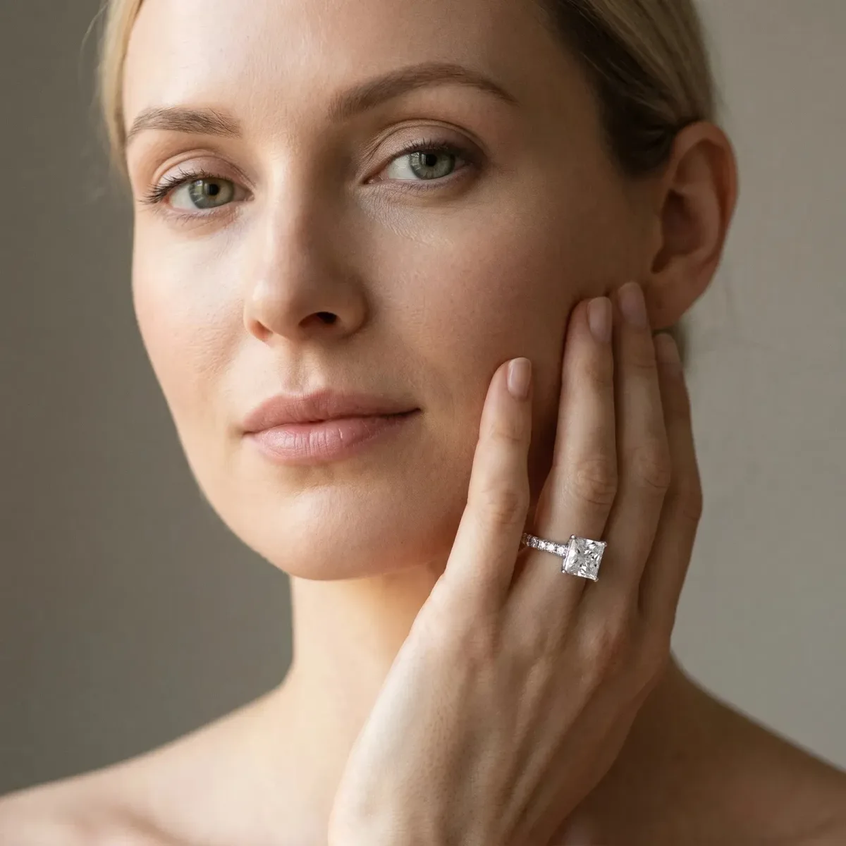 Princess Cut Solitaire Diamond with Pavé Band and Four-Prong Setting Platinum