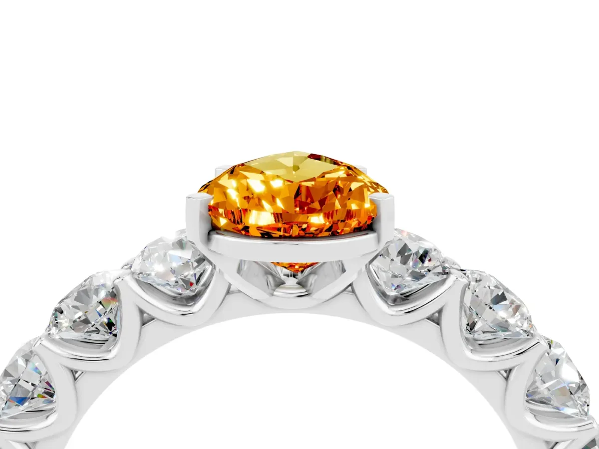 Pear Cut Citrine Prong Setting with Side Stones on a Pave Band Silver