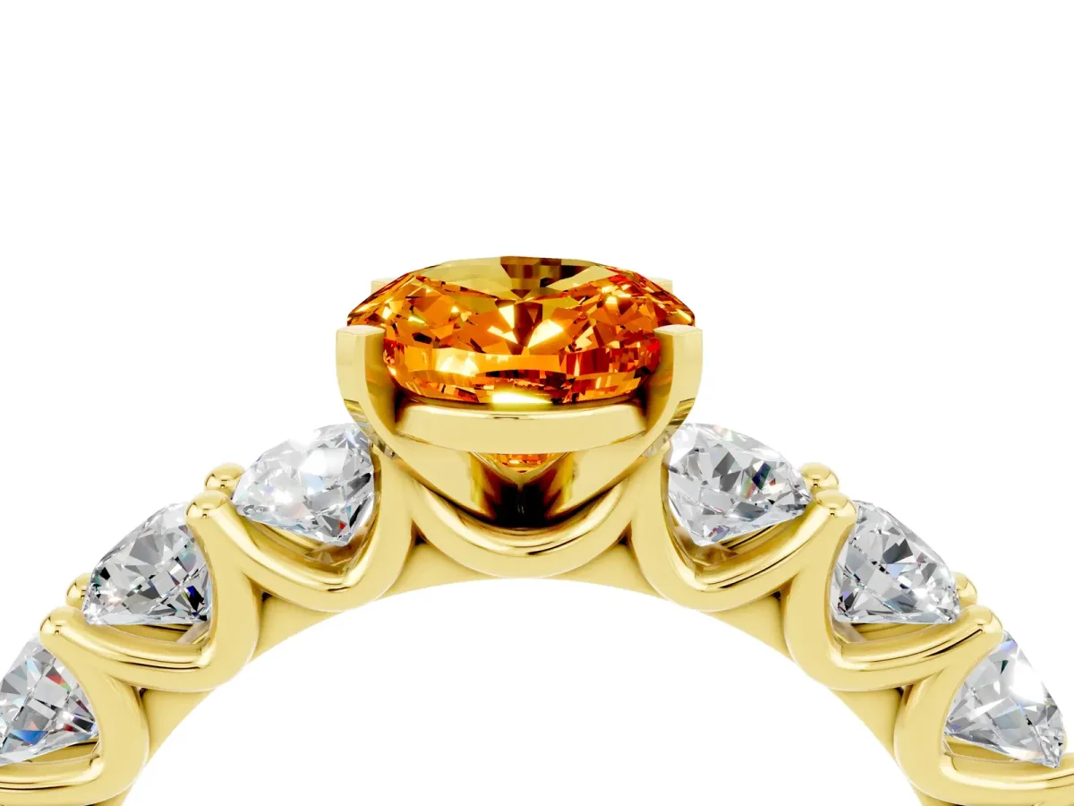 Oval Cut Citrine Prong Setting with Side Stones on a Pave Band Yellow gold
