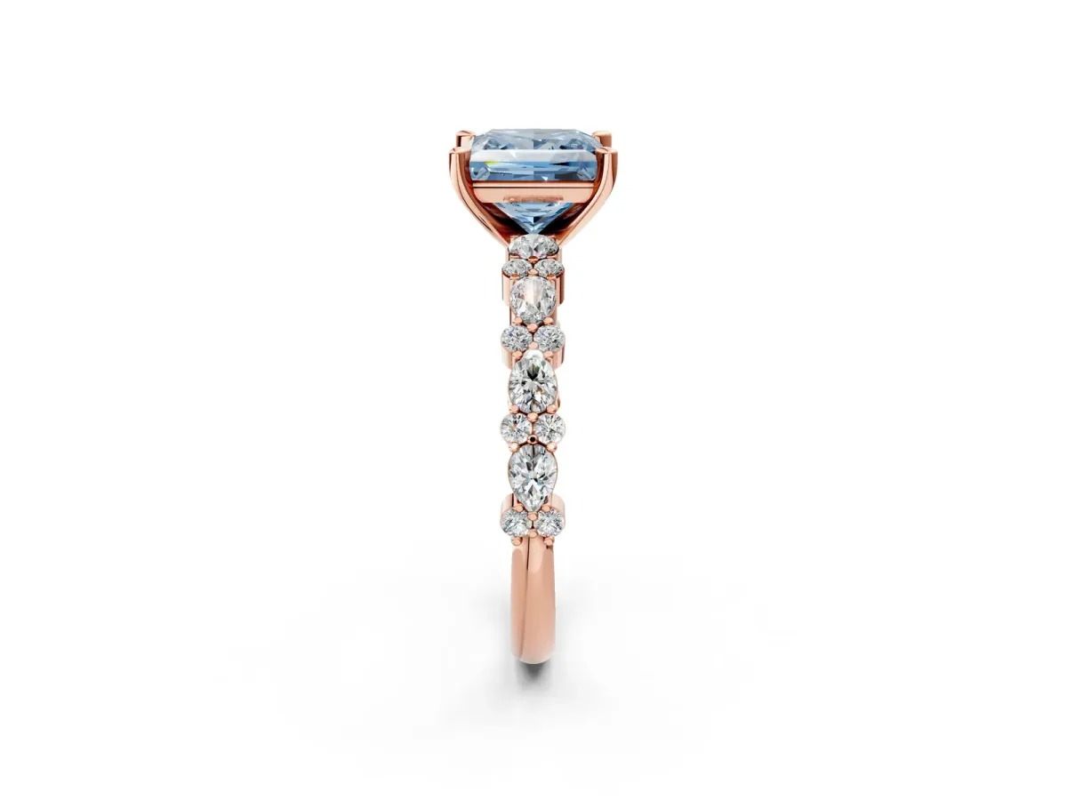 Fancy Blue Princess Cut Diamond Side Stone Solitaire Ring with Round and Four-Prong Setting Rose gold