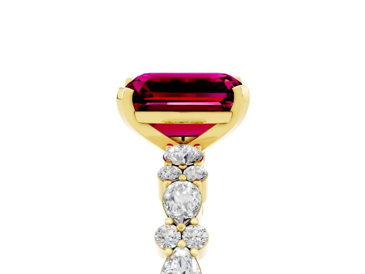 Emerald Cut Garnet Side Stone Solitaire Ring with Round and Four-Prong Setting Yellow gold