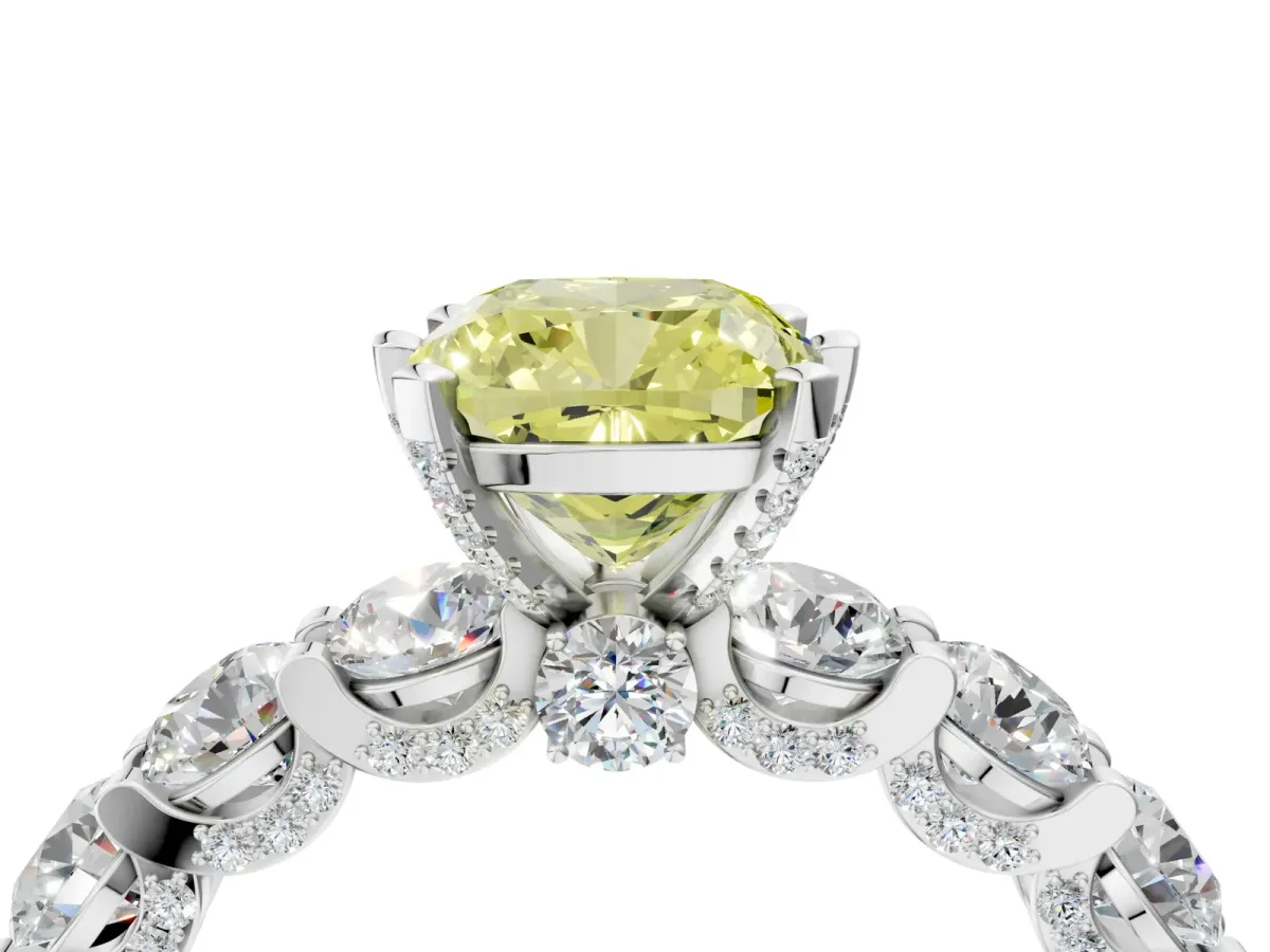 Fancy Yellow Cushion Cut Diamond Side Stone Engagement Ring with Four-Prong Setting Platinum