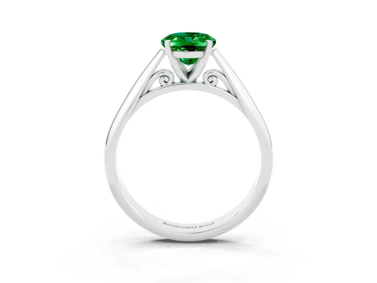 Oval Cut Emerald Solitaire Engagement Ring with Cathedral Setting and Four-Prong Mount White gold
