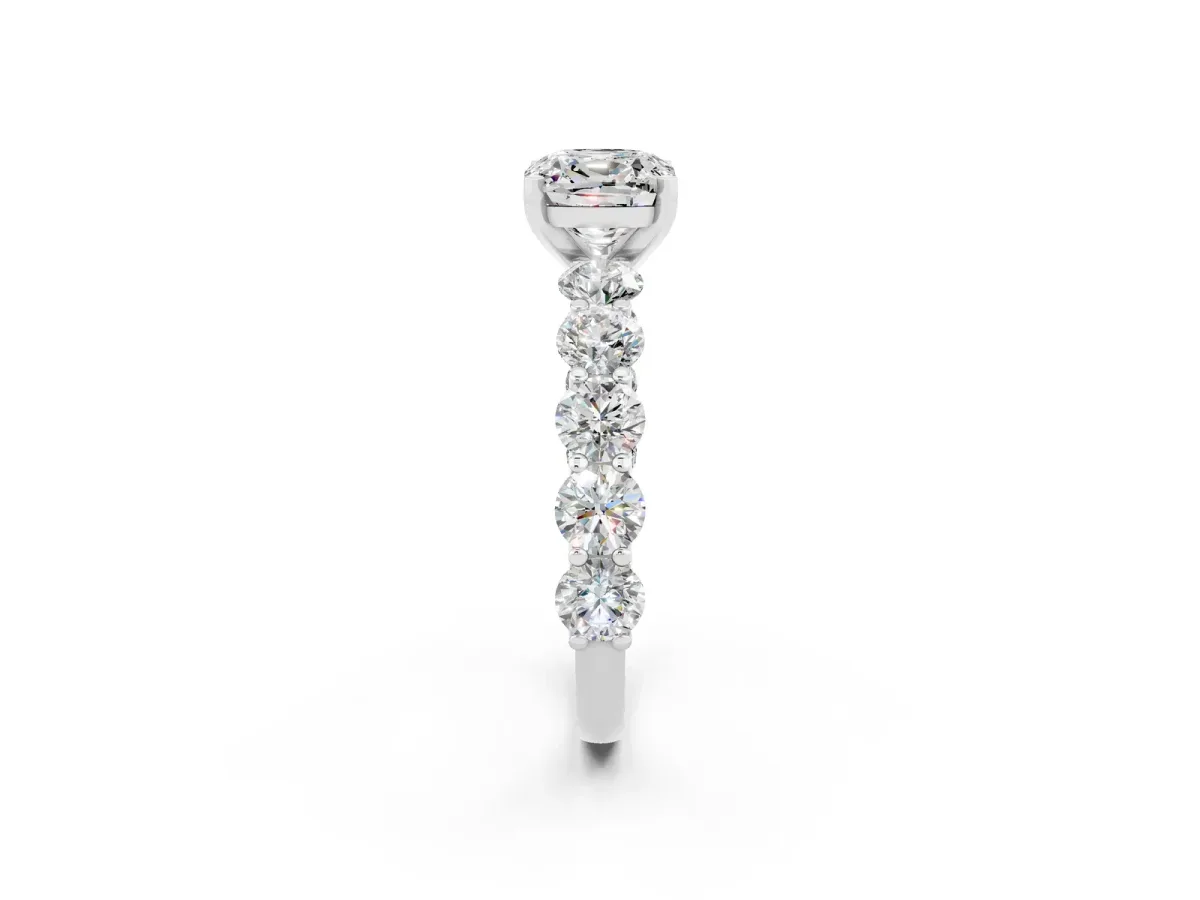 Cushion Cut Moissanite Prong Setting with Side Stones on a Pave Band Silver