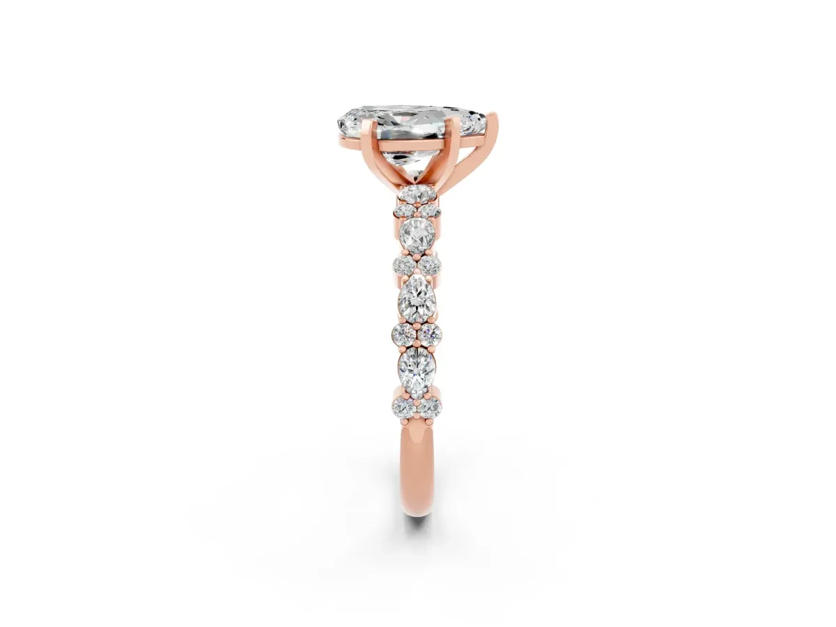 Pear Cut Moissanite Side Stone Solitaire Ring with Round and Four-Prong Setting Rose gold