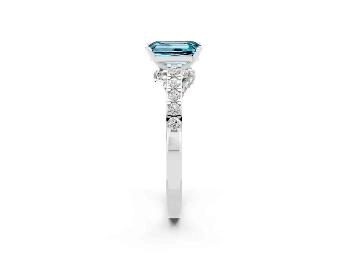 Emerald Cut Blue Topaz Solitaire Ring with Crossover Gallery and Round Pavé Band Silver