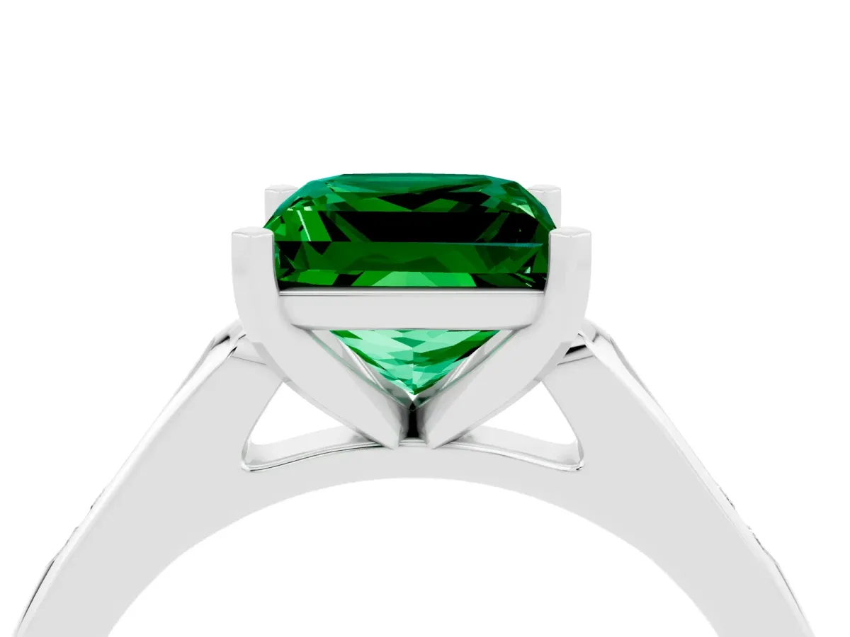 Princess Cut Emerald Solitaire Ring with Channel Set Round Band and Prong Setting Silver