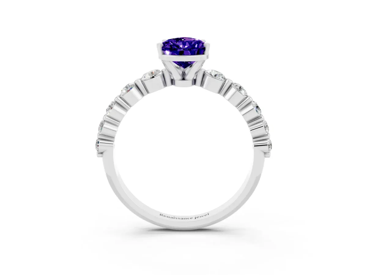 Pear Cut Solitaire Tanzanite Ring with Pave Band and Four-Prong Setting Platinum