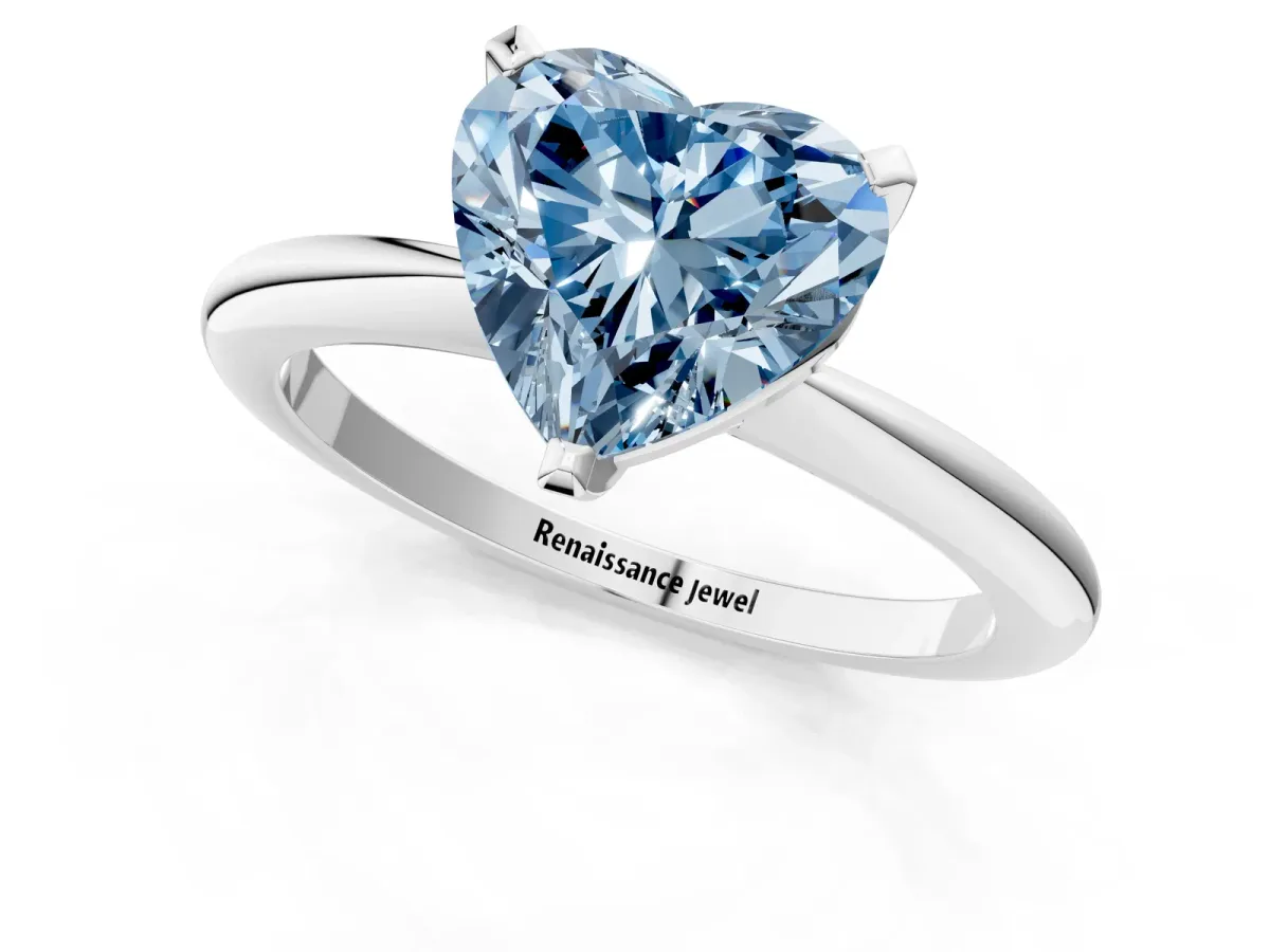 Fancy Blue Heart Cut Diamond Solitaire Ring with Six-Prong Setting and Classic Band Silver