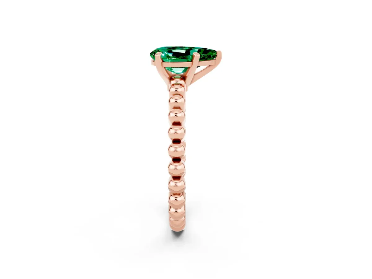 Pear Cut Emerald Solitaire Ring with Beaded Band and Prong Setting Rose gold