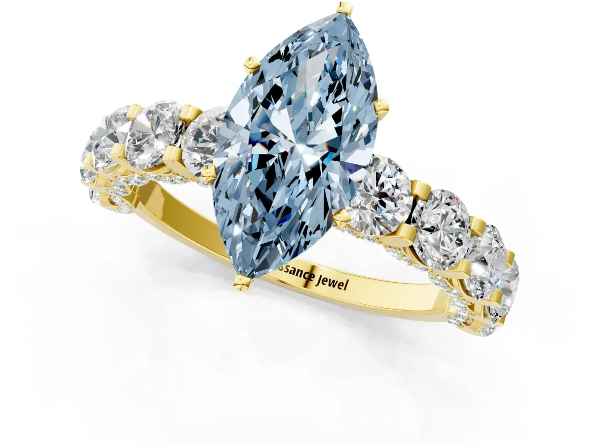 Fancy Blue Marquise Cut Diamond Side Stone Engagement Ring with Four-Prong Setting Yellow gold