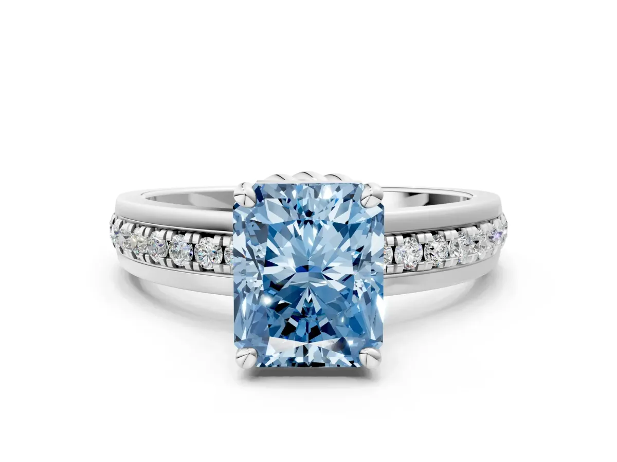 Fancy Blue Radiant Cut Solitaire Diamond Ring with Channel Set Band and Six-Prong Setting Platinum