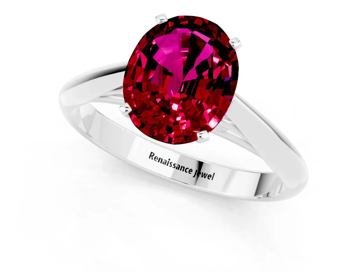 Oval Cut Garnet Solitaire Engagement Ring with Cathedral Setting and Four-Prong Mount White gold