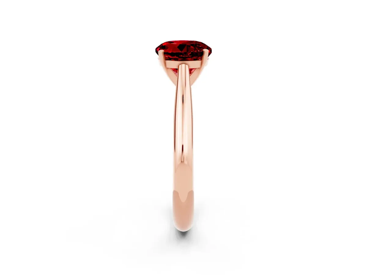 Round Cut Ruby Solitaire Engagement Ring with Cathedral Setting and Four-Prong Mount Rose gold