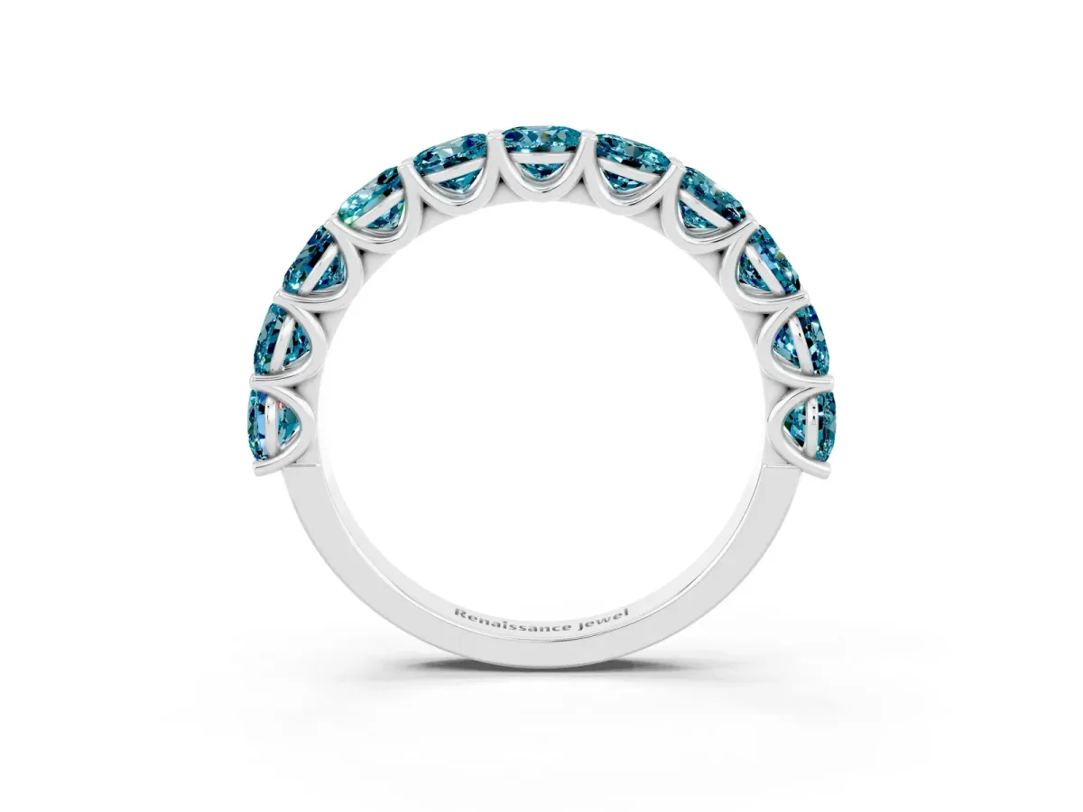 Round Blue Topaz Shared Prong Eternity Band Platinum