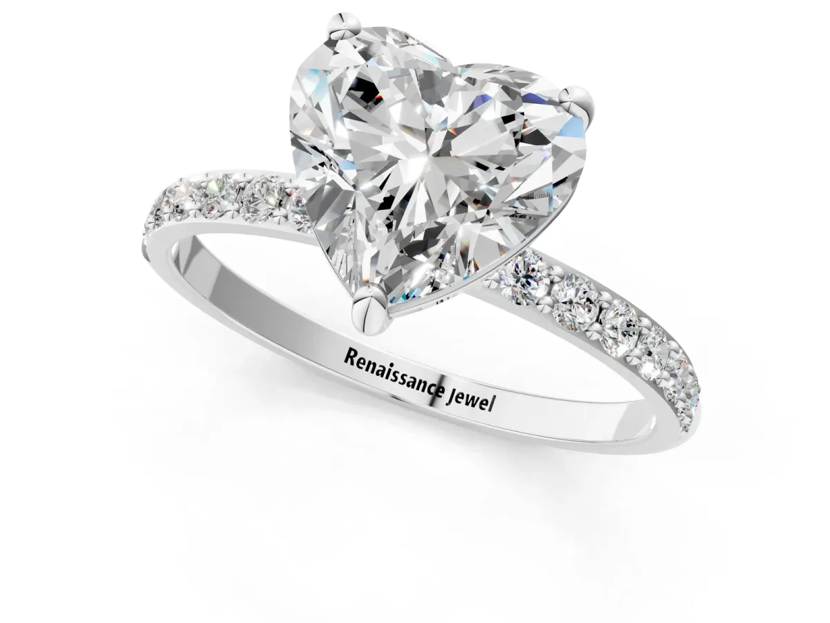 Heart Cut Diamond Solitaire Ring with Round Pavé Band and Prong Setting Silver
