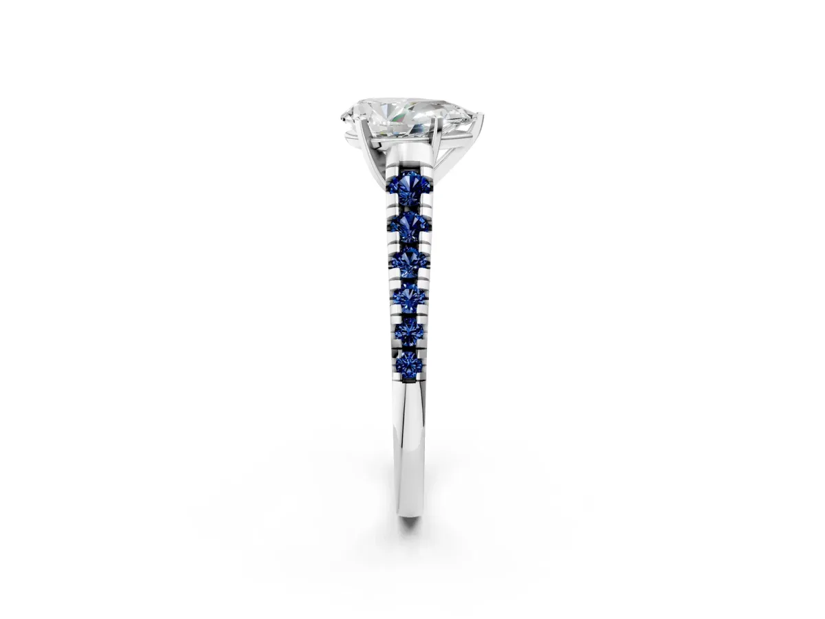 Pear Cut Diamond Cathedral Solitaire Ring with Round Blue Sapphire Pavé Band Platinum
