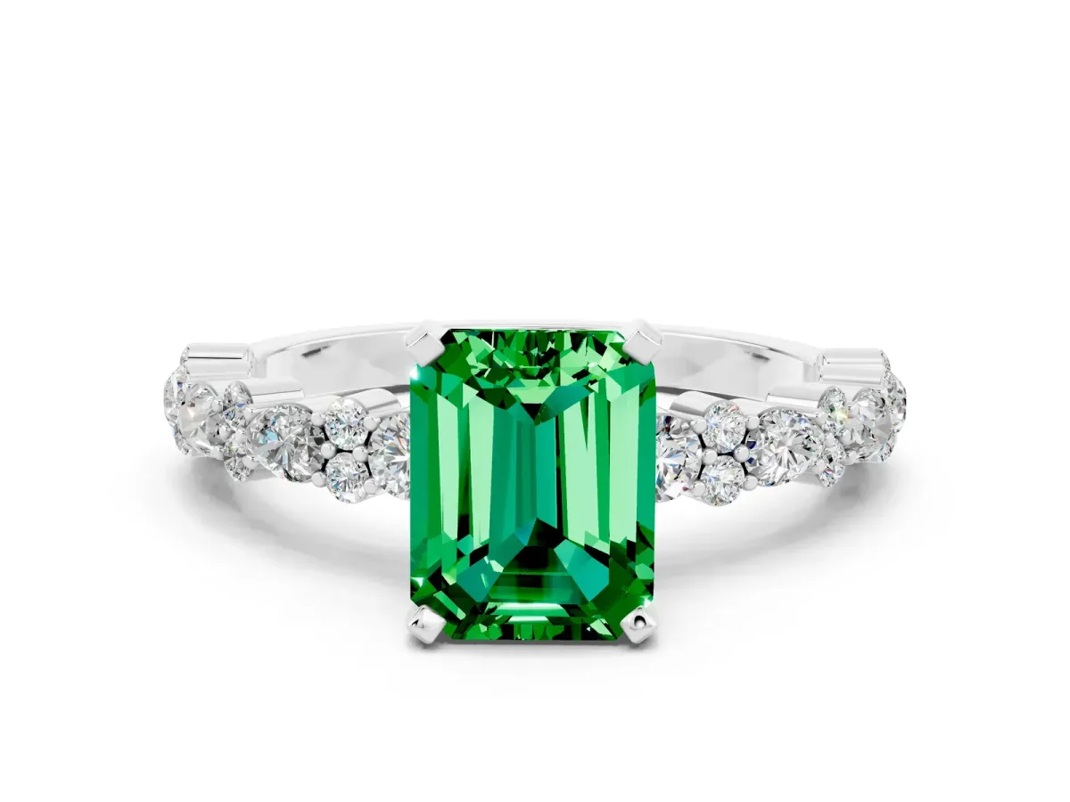 Emerald Cut Emerald Side Stone Solitaire Ring with Round and Four-Prong Setting White gold