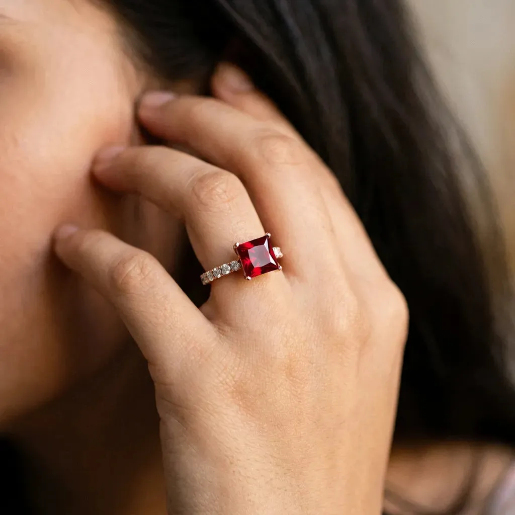Princess Cut Ruby Solitaire Ring with Round Pavé Band and Four-Prong Setting Rose gold