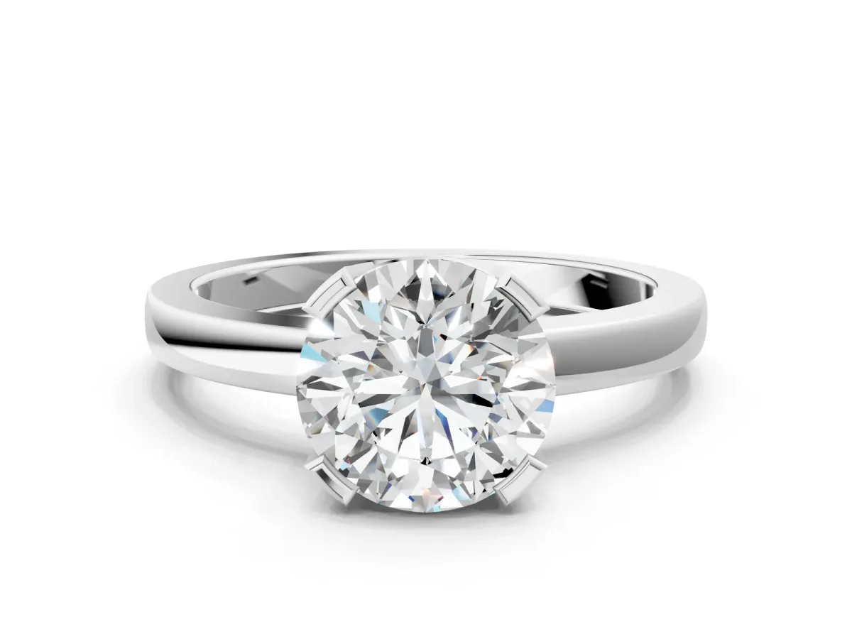 Round Cut Cut Solitaire Ring with Four-Prong Setting and Classic Band Silver