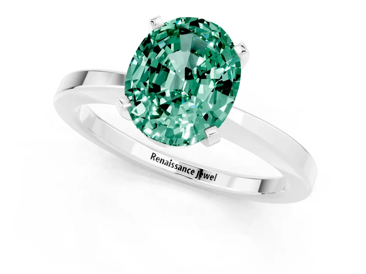 Oval Cut Green Sapphire Solitaire Engagement Ring with Classic Band and Four-Prong Setting Silver