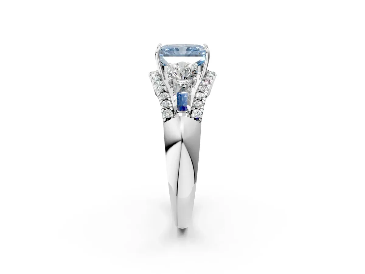 Fancy Blue Three-Stone Radiant Cut Diamond Engagement Ring with Pave Band and Prong Setting Platinum