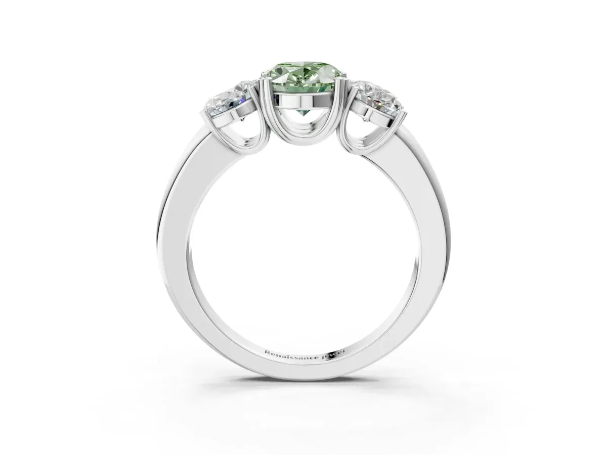 Fancy Green Three-Stone Oval Cut Cut Diamond Ring with Channel Set Band and Four-Prong Setting Platinum