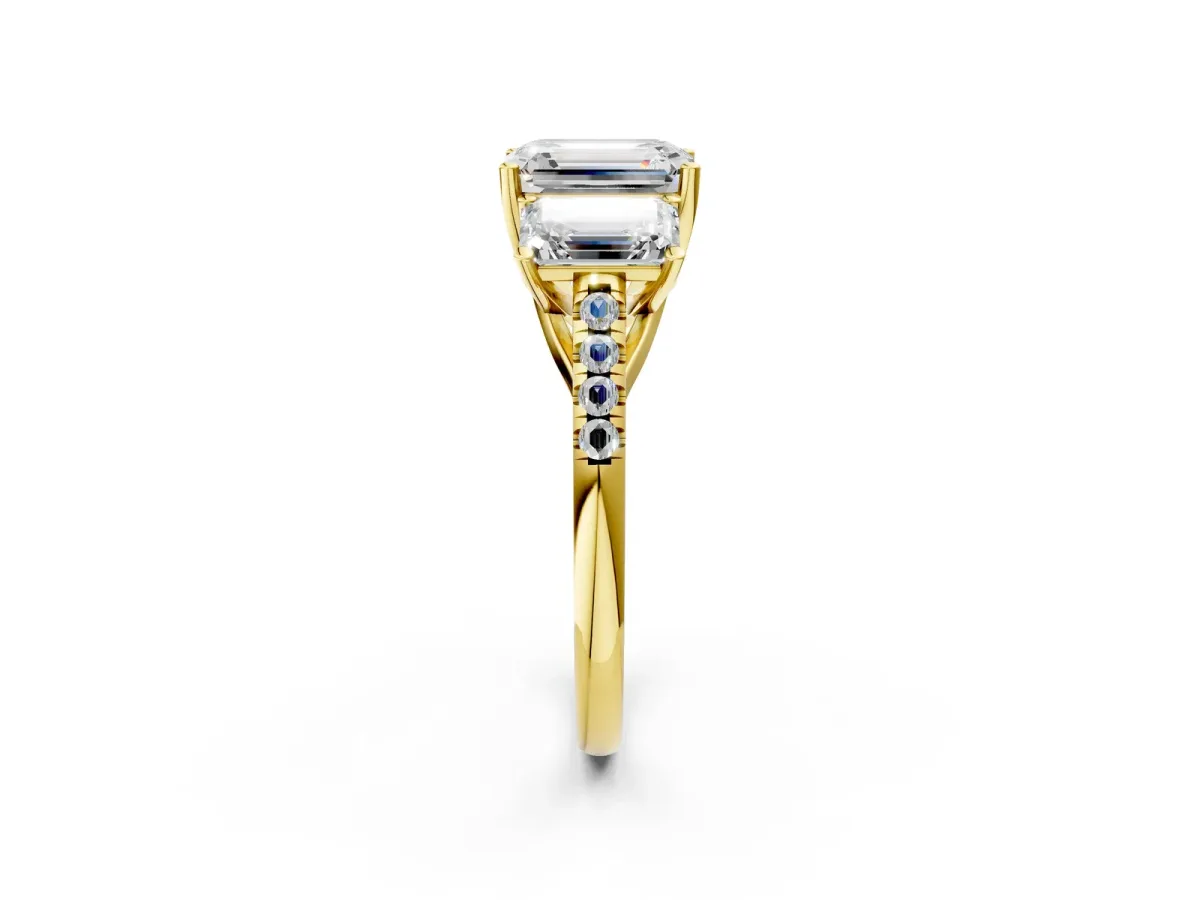 Three-Stone Emerald Cut Diamond Ring with Round Pavé Band and Prong Setting Yellow gold