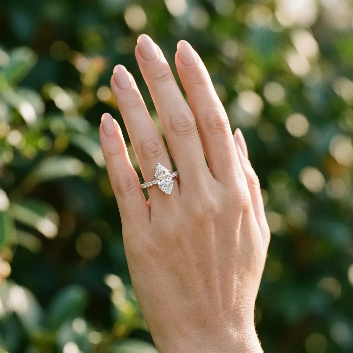 Marquise Cut Cut Solitaire Diamond Engagement Ring with Pave Band and Four-Prong Setting Silver
