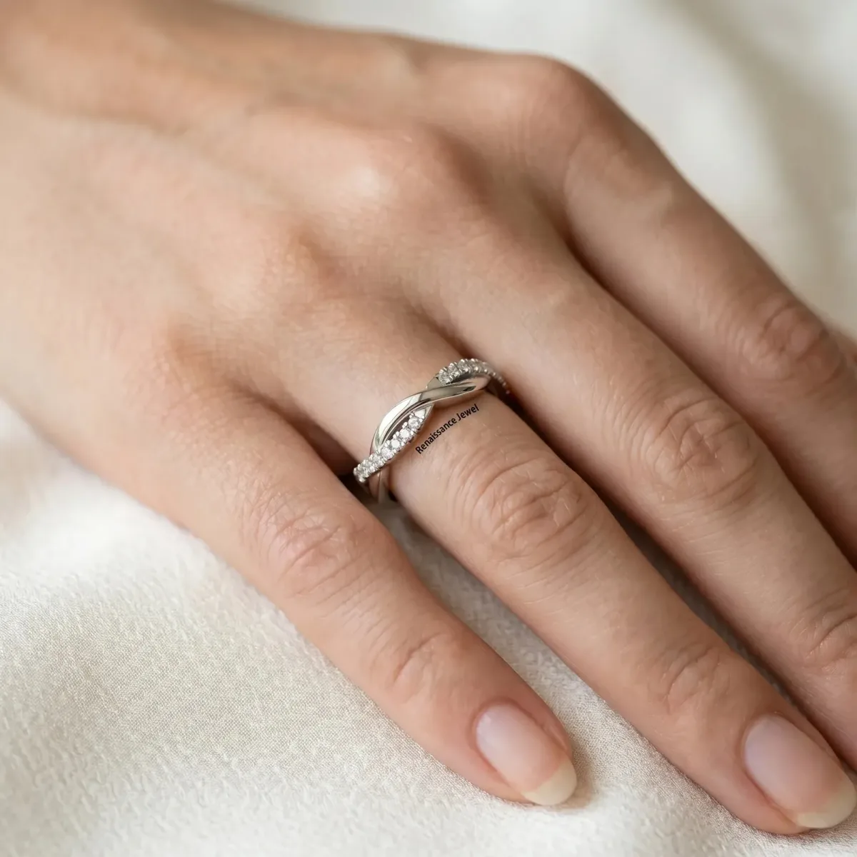 Round Diamond Twisted Infinity Band with Prong Setting Platinum