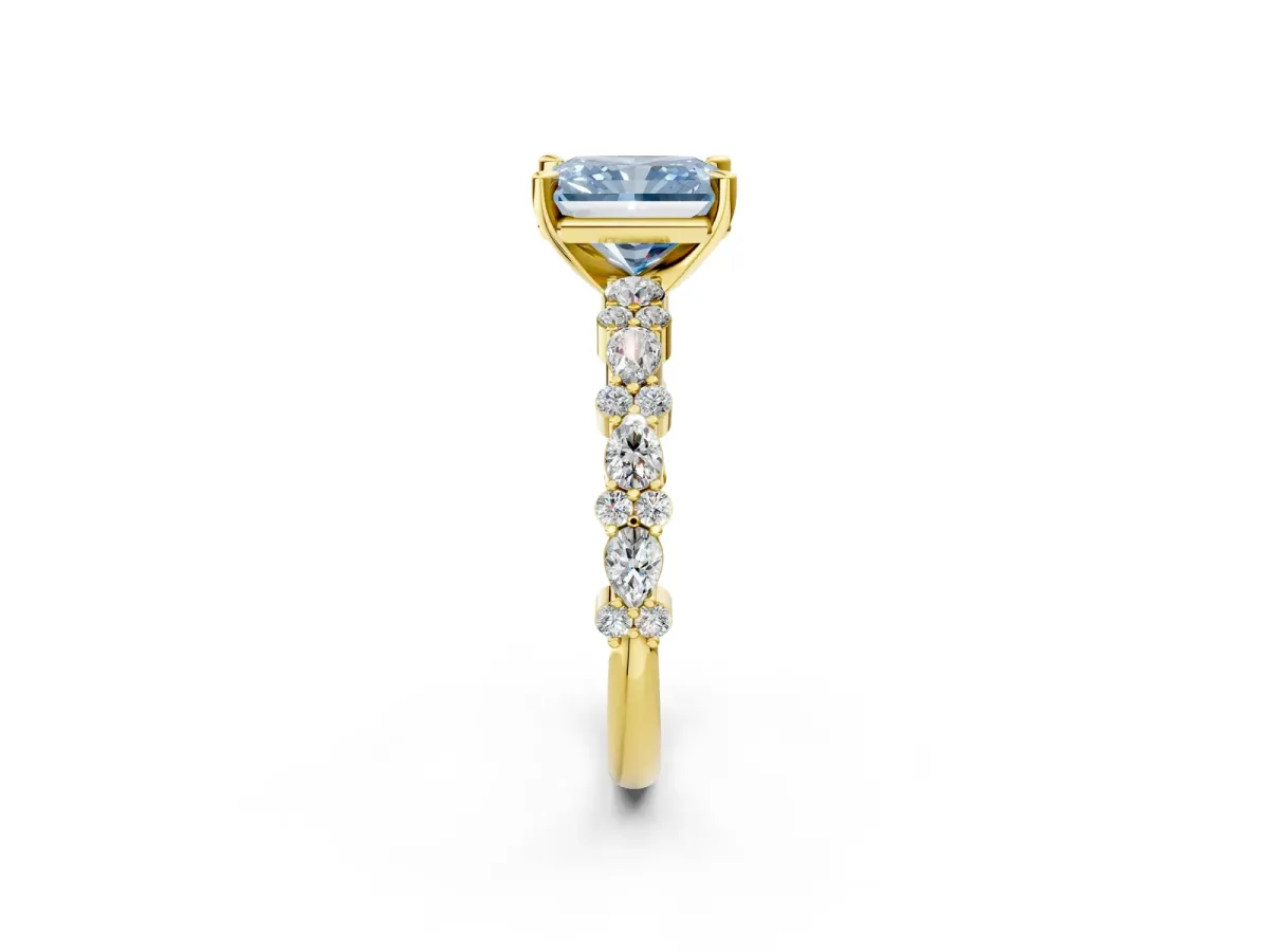 Fancy Blue Radiant Cut Diamond Side Stone Solitaire Ring with Round and Four-Prong Setting Yellow gold