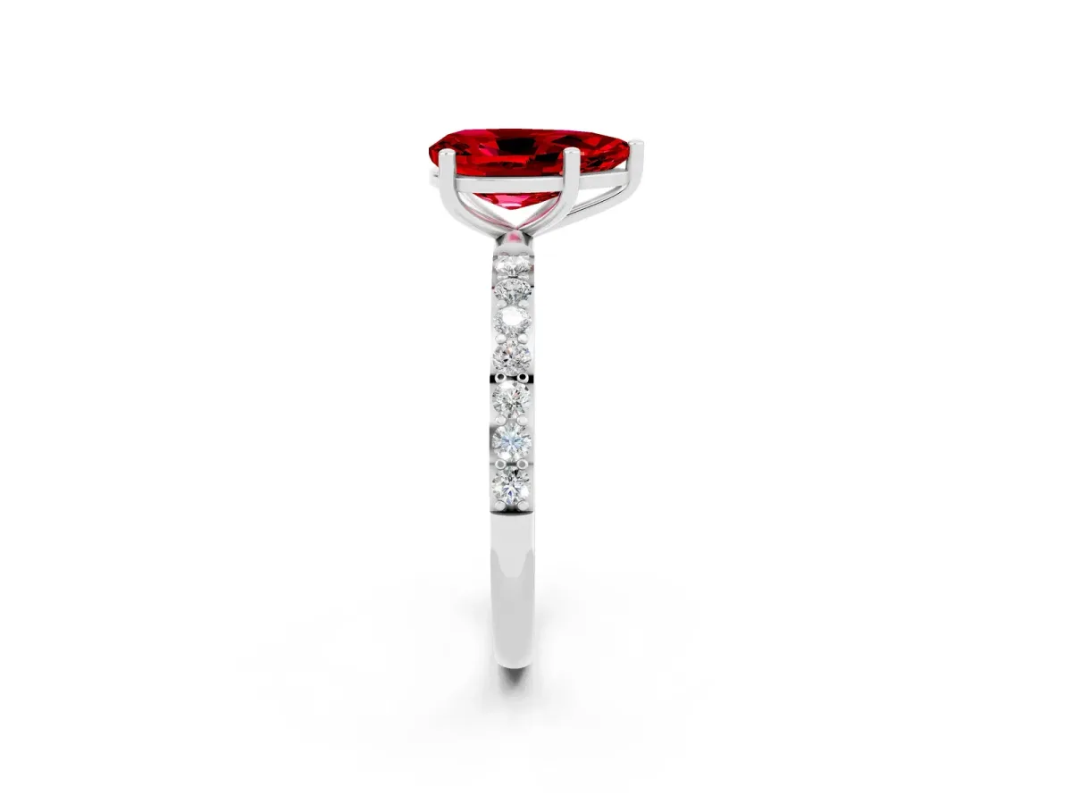 Pear Cut Ruby Solitaire Ring with Round Pavé Band and Prong Setting White gold