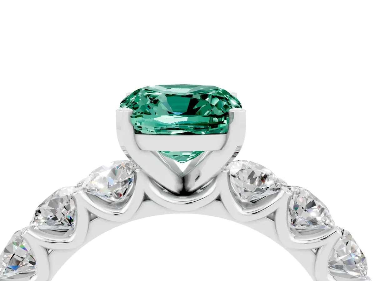 Cushion Cut Green Sapphire Prong Setting with Side Stones on a Pave Band Silver