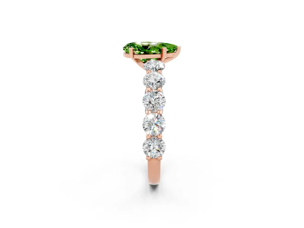 Pear Cut Peridot Prong Setting with Side Stones on a Pave Band Rose gold