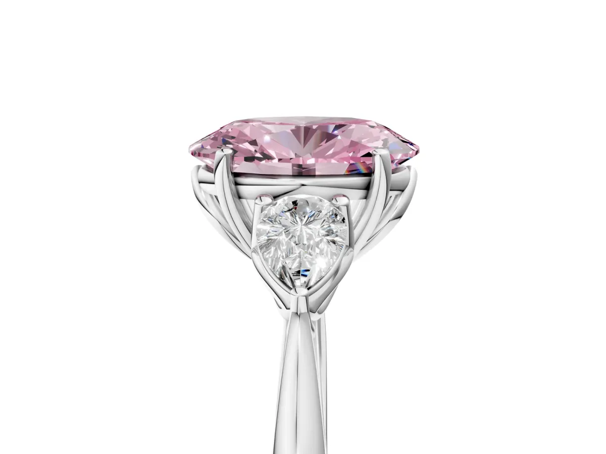 Fancy Pink Three-Stone Oval Cut Diamond Ring with Pear Side Stones in Four-Prong Setting White gold