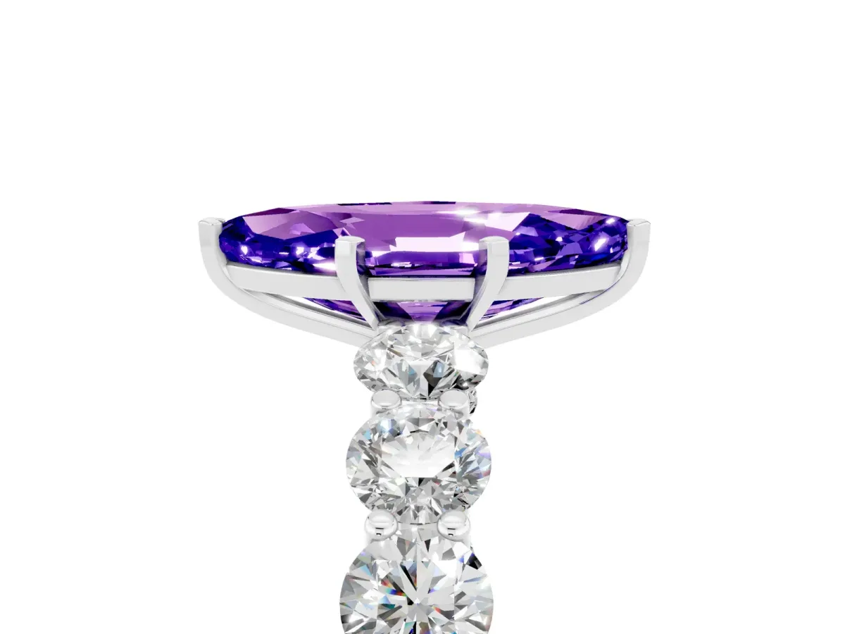 Marquise Cut Tanzanite Prong Setting with Side Stones on a Pave Band Silver