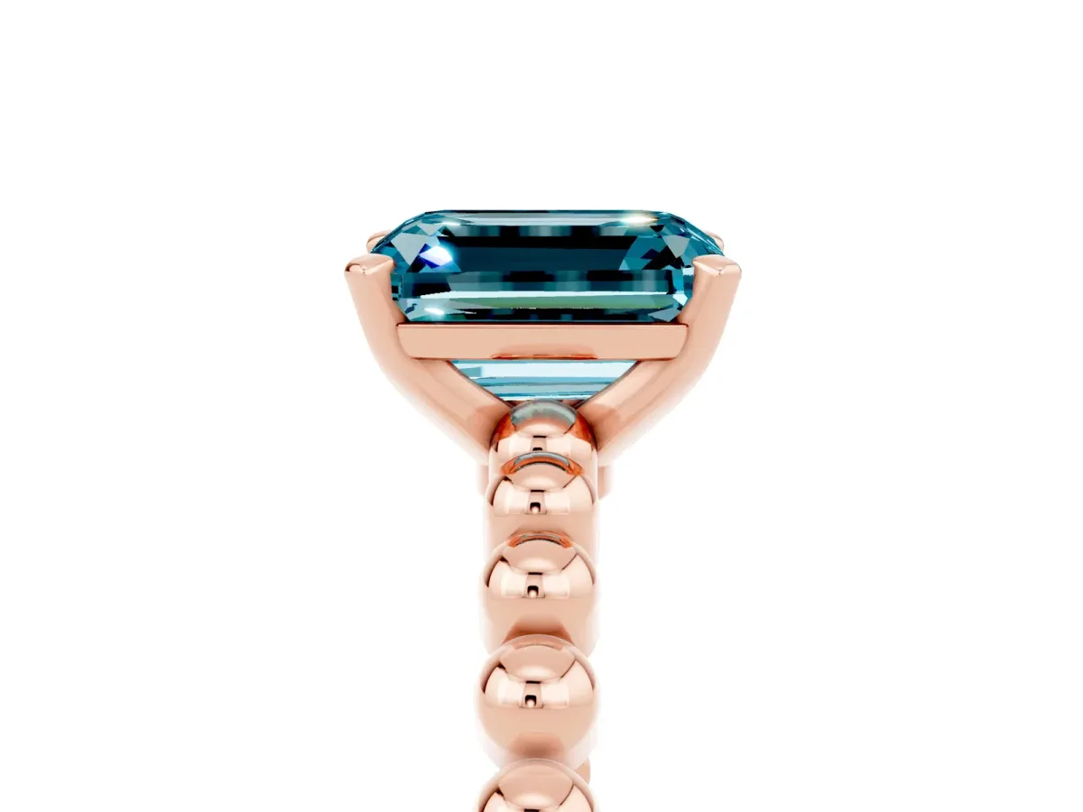 Emerald Cut Blue Topaz Solitaire Ring with Beaded Band and Prong Setting Rose gold