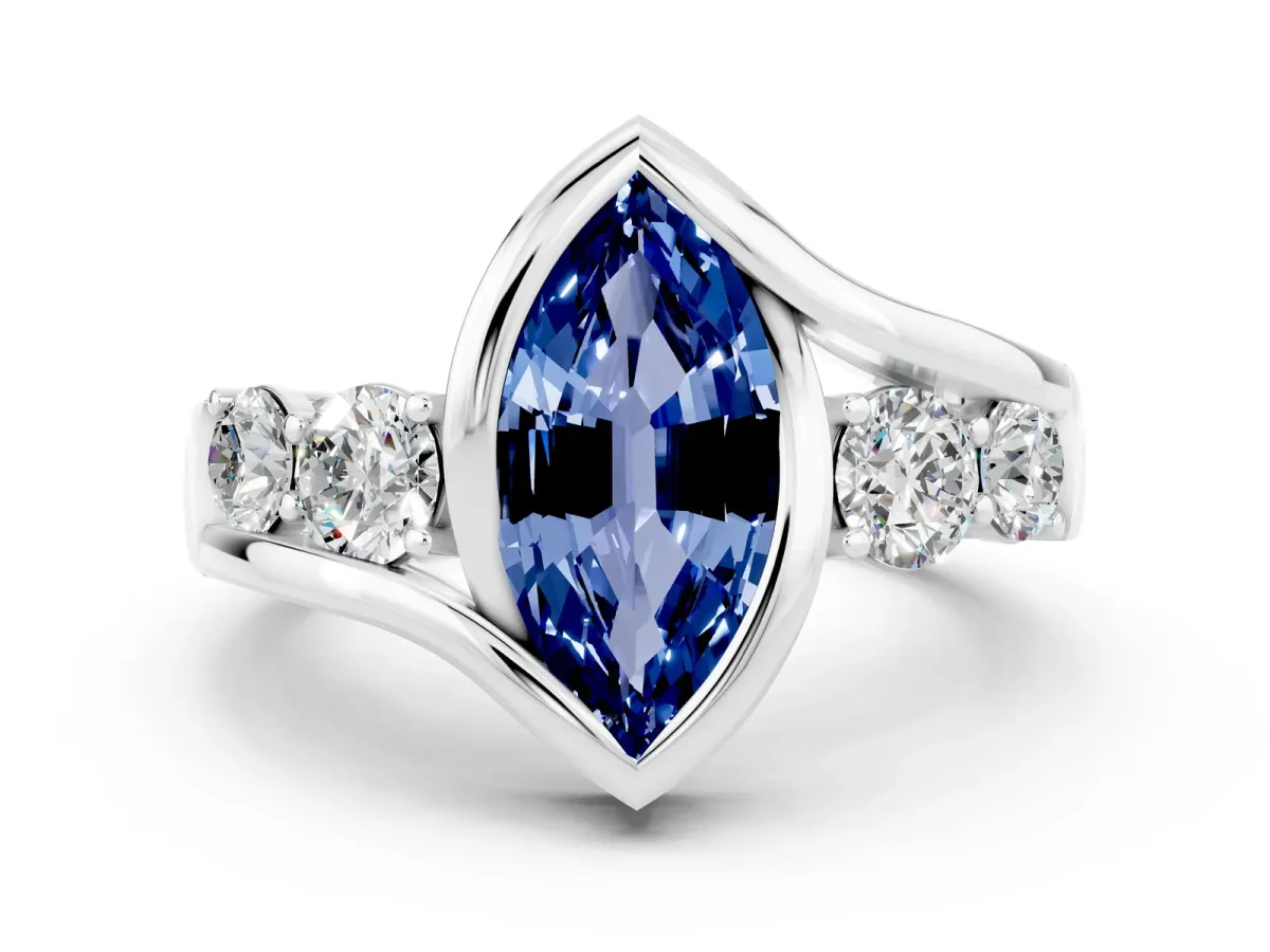 Bezel Set Marquise Cut Blue Sapphire Bypass Ring with Round Accents Silver