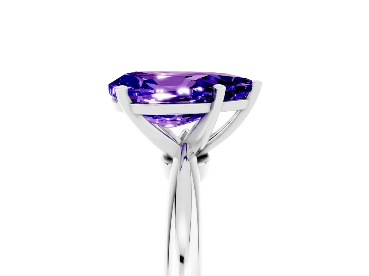 Pear Cut Tanzanite Solitaire Ring with Six-Prong Setting and Classic Band Silver