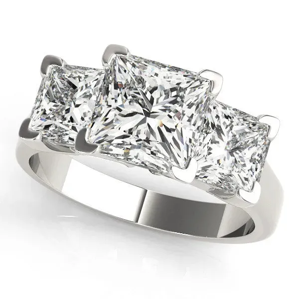 Three-Stone Pear Cut Cut Diamond Ring with Channel Set Band and Four-Prong Setting Platinum