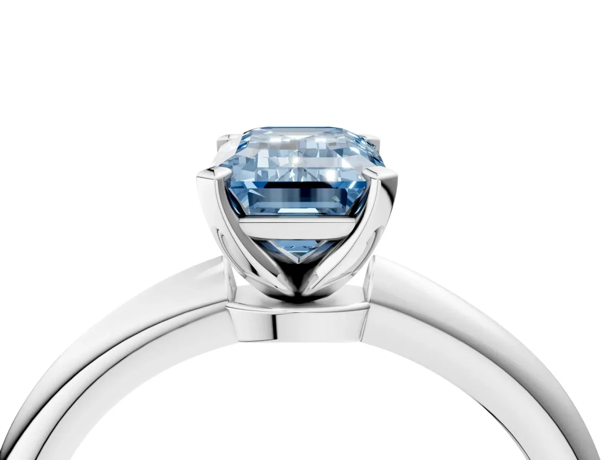 Fancy Blue Emerald Cut Diamond Solitaire Ring with Six-Prong Setting and Classic Band Platinum