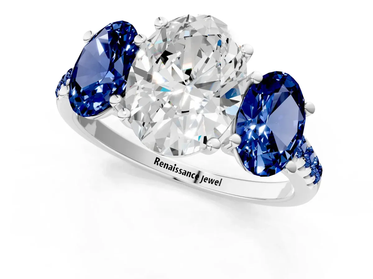 Three-Stone Oval Cut Diamond Ring with Round Blue Sapphire Pavé Band and Prong Setting Silver