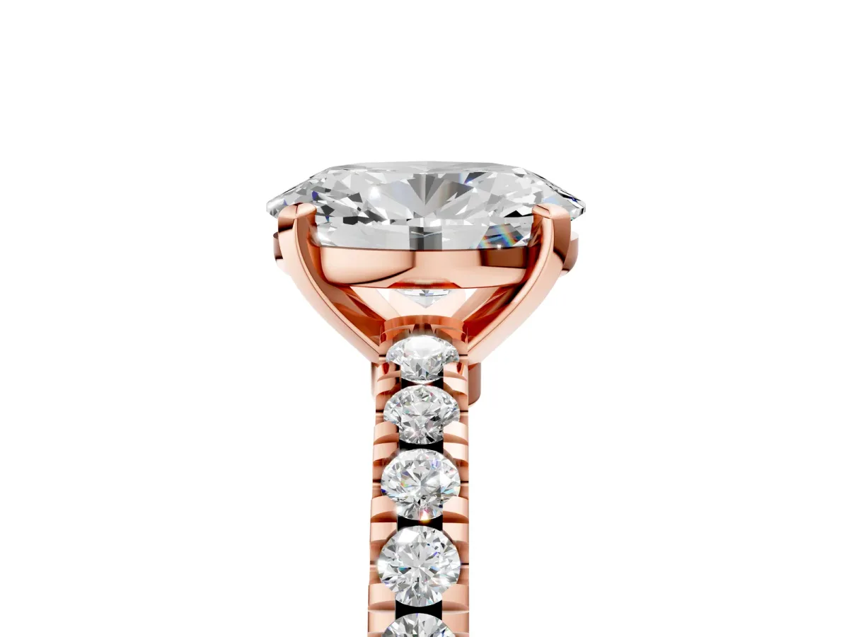 Oval Cut Solitaire Diamond with Pavé Band and Four-Prong Setting Rose gold
