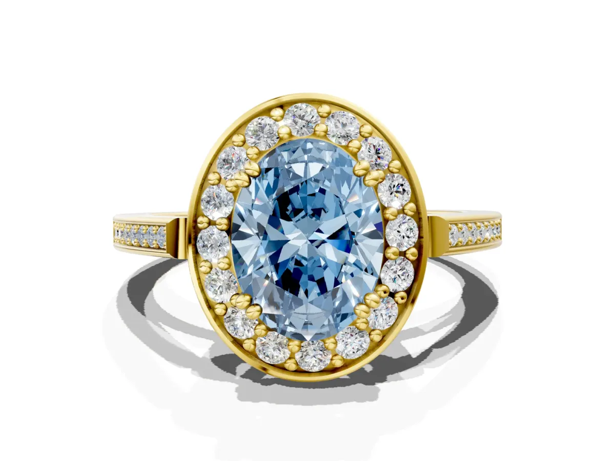 Fancy Blue Oval Cut Diamond Halo Ring with Split Shank and Four-Prong Setting Yellow gold